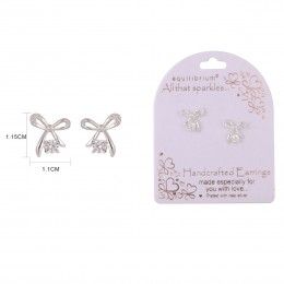 Silver stud earrings featuring a small, pink bow design with the EQ Chic brand logo