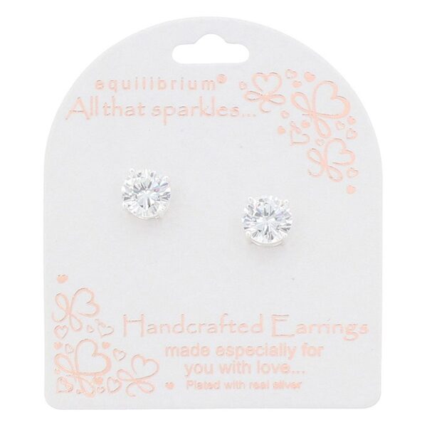 Round solitaire silver plated stud earrings with sparkling clear crystals displayed on “All That Sparkles” Equilibrium card