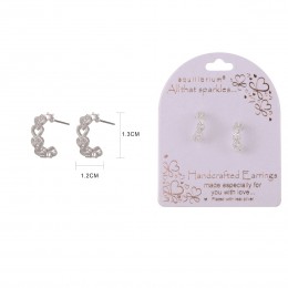 Silver open heart hoop earrings with a polished finish, presented on a white background