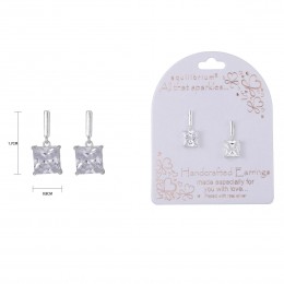 White square dangling earrings with a silver setting and EQ branding