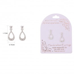 White drop earrings with a delicate, shimmering finish and a subtle sparkle